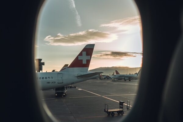 white plane on runway