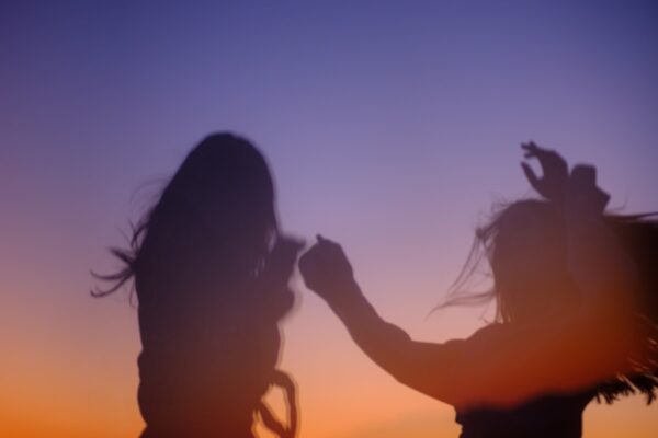 silhouette of woman during sunset